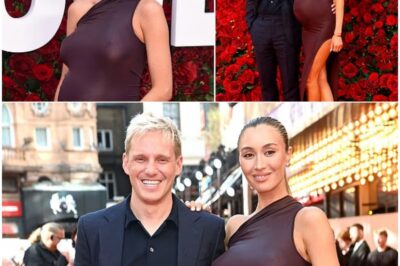 The Ultimate Baby Bump Debut: Sophie Habboo Looks Sensational as She Flaunts Her Growing Baby Bump in a Figure-Hugging Dress at a Star-Studded Premiere.